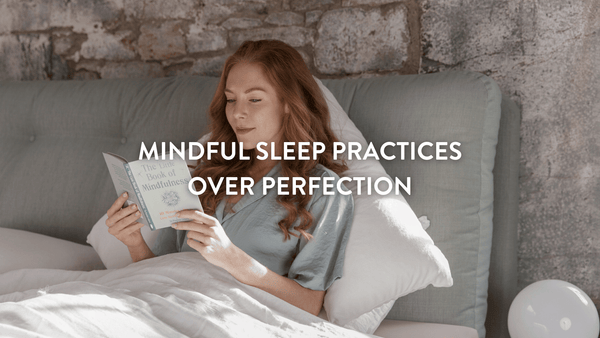 Person sitting upright in bed reading The Little Book of Mindfulness