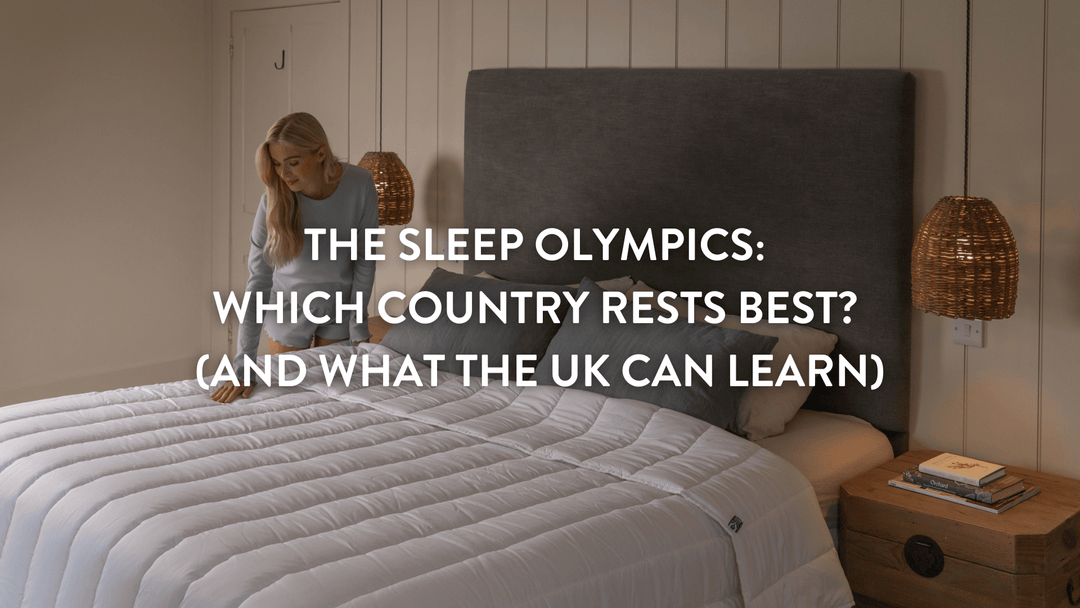 person making a large double bed with a crisp white Putnams duvet a pillow set