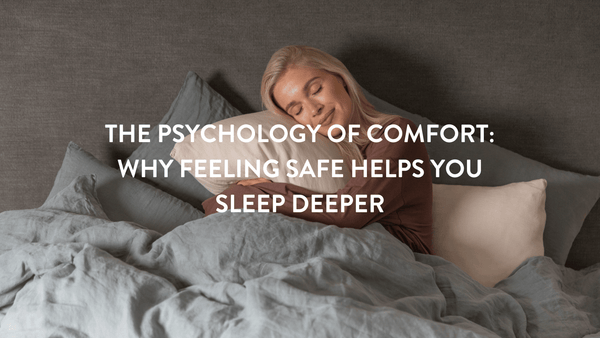 Pesron sitting up in bed hugging a Putanms pillow 