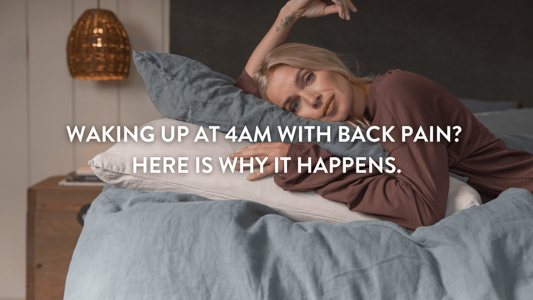 Person lying on a stack of Putnams pillows wide awake at night on a double bed