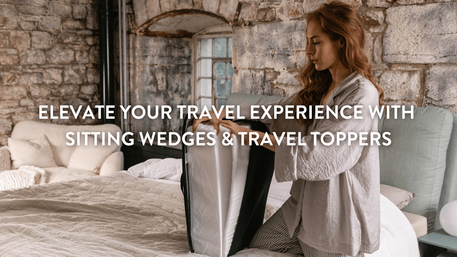 person unfolding a putnams travel wedge on a bed