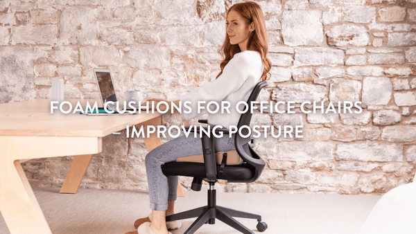 Person sitting at a desk using a Putnams seat wedge on an office chair 