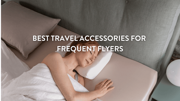 Person lying in a bed using a Putnams Travel Pillow 