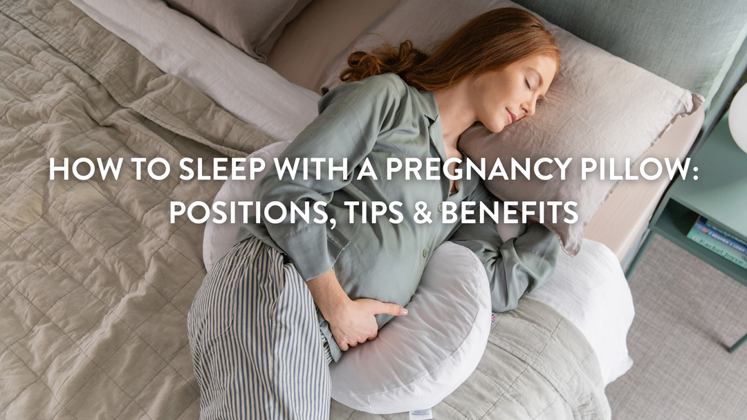 Person sleeping on a double bed using the Putnams pregnancy pillow for comfort