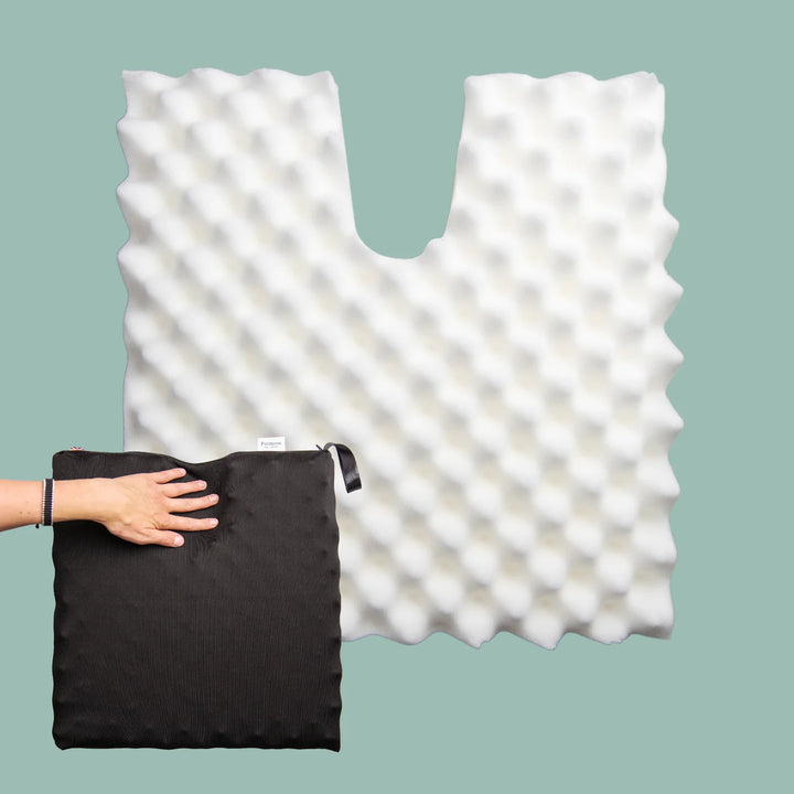 Tailbone Pain Cushion with a cut out for pressure relief at the back of the cushion. Stretch navy blue or black cover available in different sizes. High density foam with a 2 year guarantee.