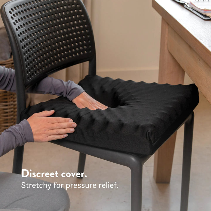 Ischial Bursitis Cushion for pressure relief and comfort- cut out discreet with cover. Handmade in the UK. 2 Year guarantee.