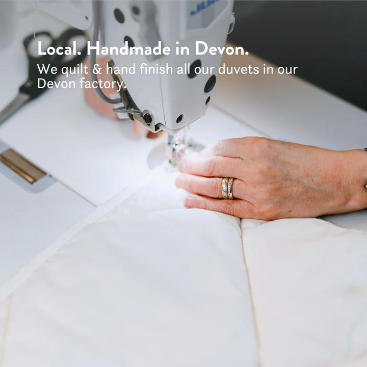 British Wool Summer Duvet 100% cotton handmade in the UK made to be hypo-allergenic, anti dust mite & sustainable. Natural bedding.