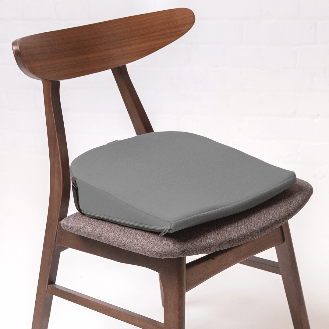 https://putnams.co.uk/cdn/shop/products/grey-charcoal-11-degree-wedge-sitting-posture-cushion-pillow-back-pain-hip_1800x1800.png?v=1673532342